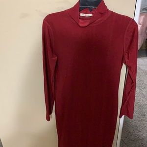 Burgundy long sleeve with a spilt for the legs